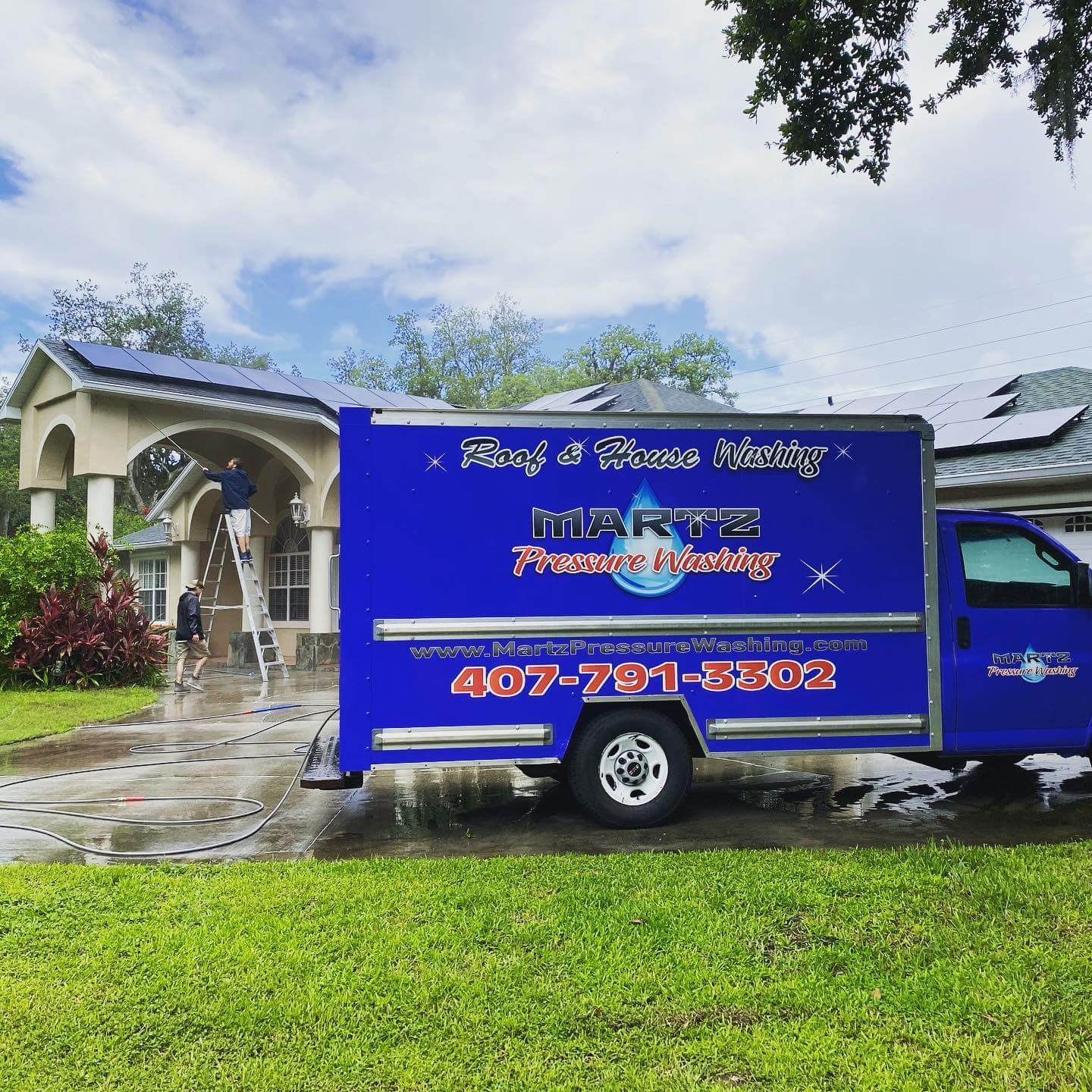 martz pressure washing blue truck